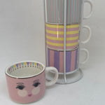 Mugs in a rack piccole